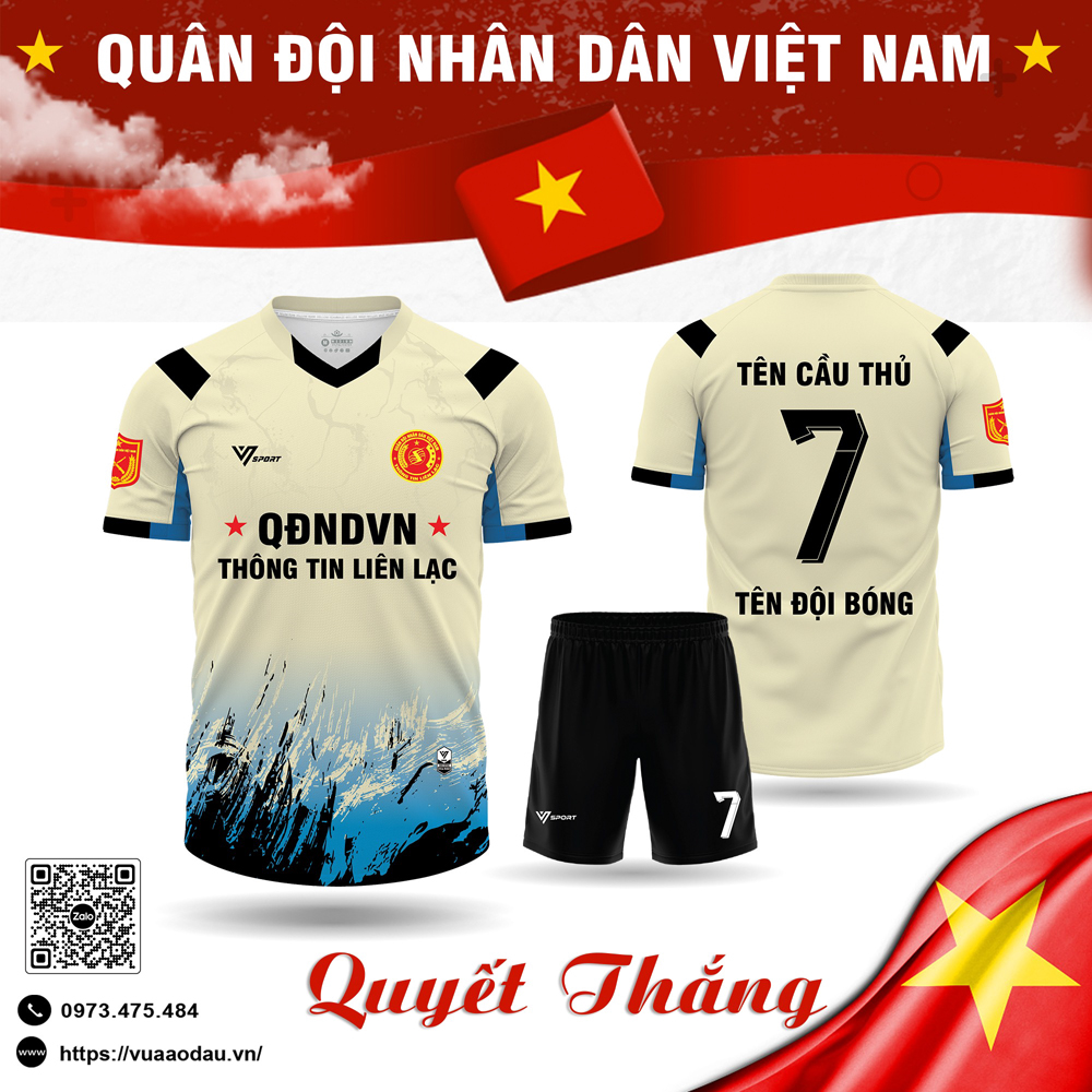 Áo bóng đá thiết kế quân đội màu kem với họa tiết sóng, logo đỏ vàng nổi bật