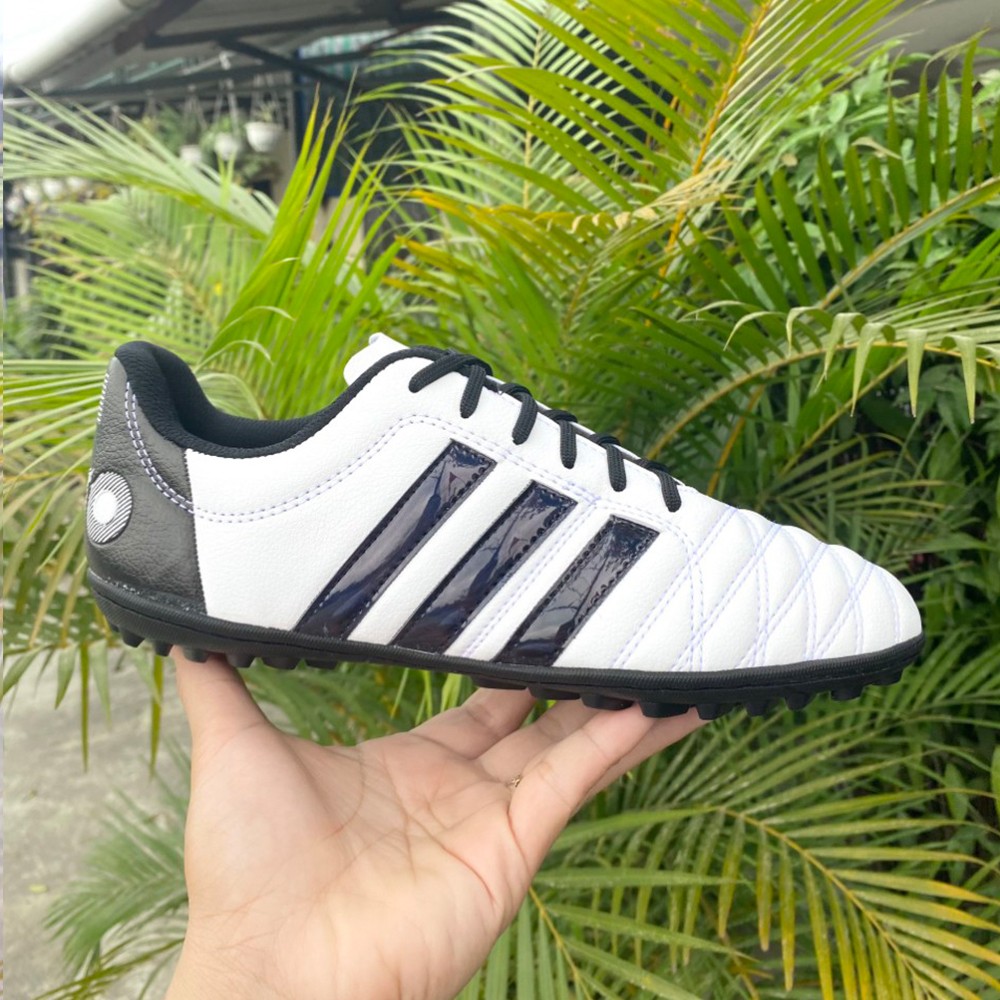 Giày đá bóng Toni Pro 11 trắng đen phối màu thể thao sang trọng